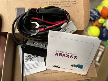 Kasse med ABAX trackere